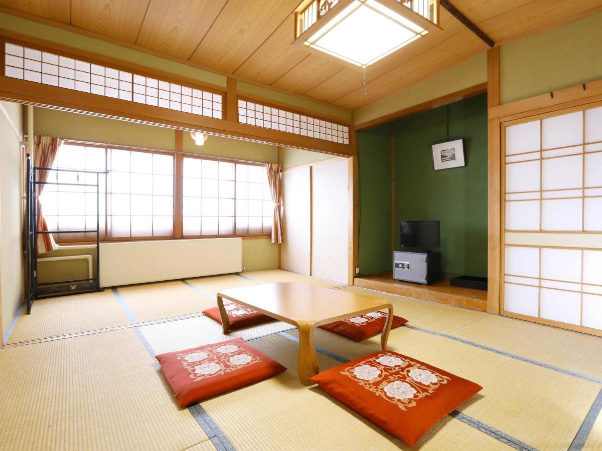 New Yokote Hotel Yamanouchi  Bagian luar foto